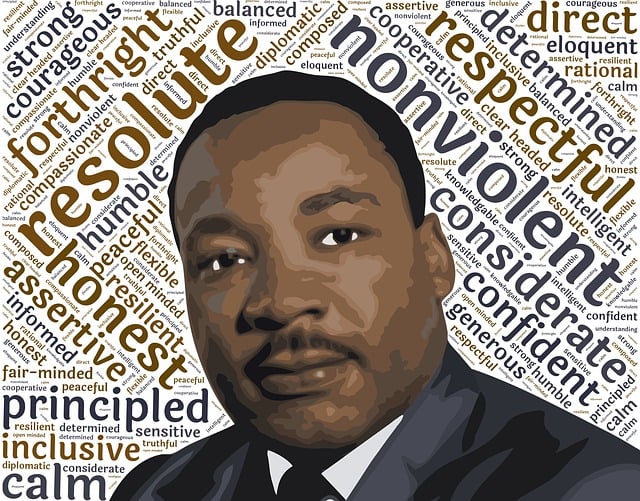 Martin Luther King Jr. with words that describe his leadership, like strong, nonviolent, respectful, and inclusive in the background.